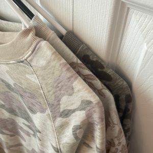 three patterned old navy crewnecks